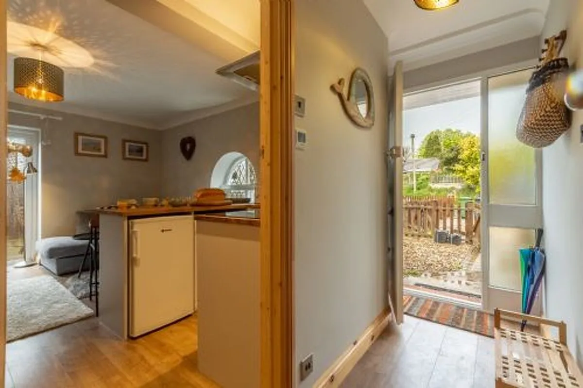 Ground floor: Entrance with hooks for coats and storage for shoes