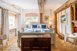 Belchamp Hall Mill, Belchamp Walter: Bedroom with super-king size bed